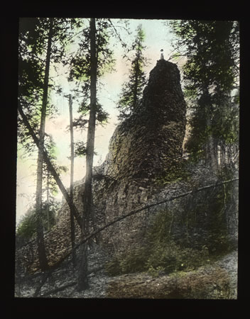 Woman on top of Basalt/Frank Palmer, Photographs, Spokane City Parks, Lantern Slides, 1900-1930, Washington State Archives, Digital Archives.