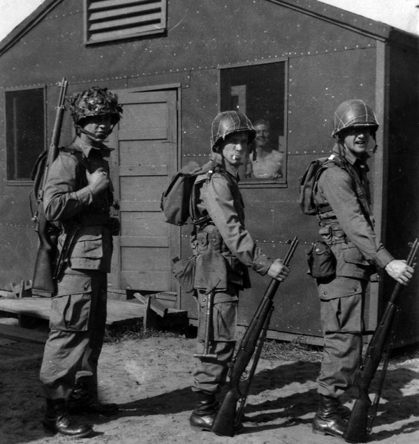 Bob Hart, Eddie Meingasher, and John Bonner. Texas Twibell in window.  (Photo courtesy of Legacy Washington)